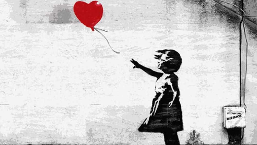 Banksy: la bambina con il palloncino rosso si autodistrugge